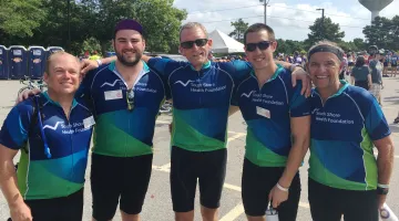 The 2019 PMC Team poses at a water stop.